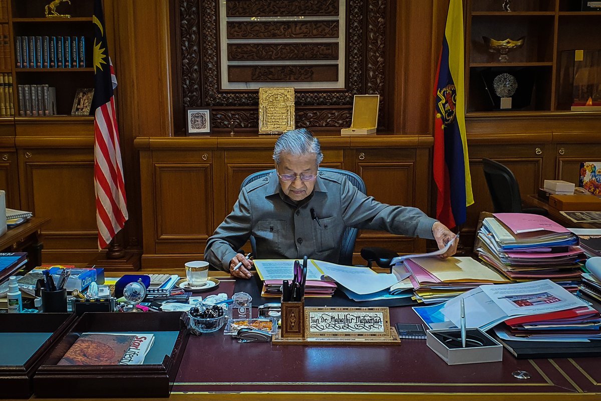 Tun Dr Mahathir in his office